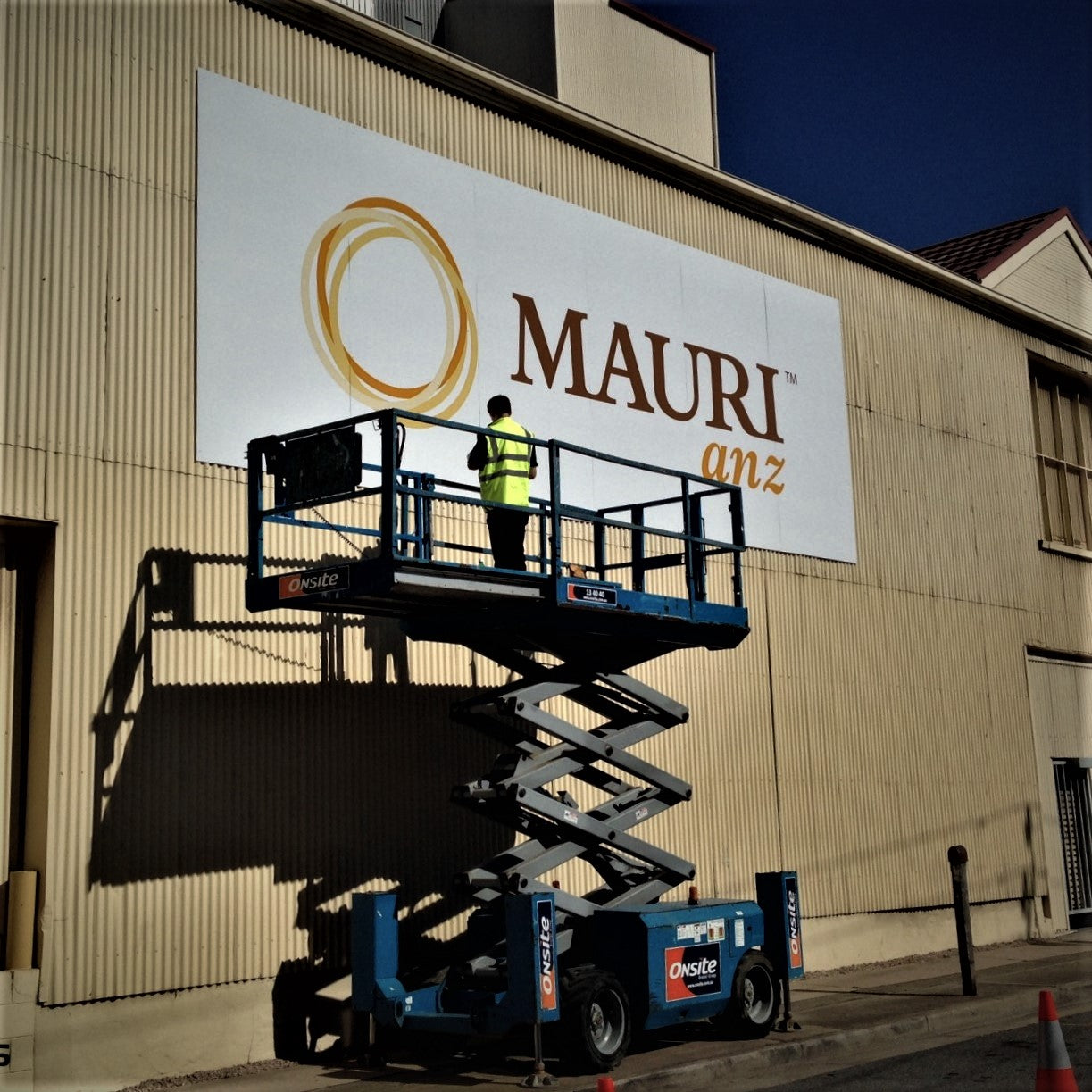 Large ACM Sign instalation on the side of an Adelaide company building