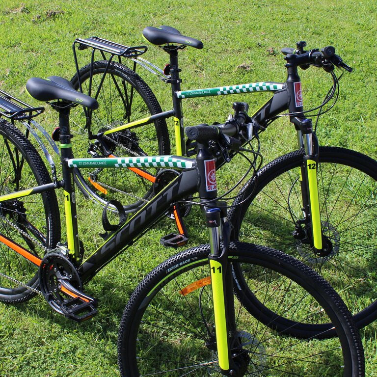 Bike decals with coloured print, logos and reflective bands