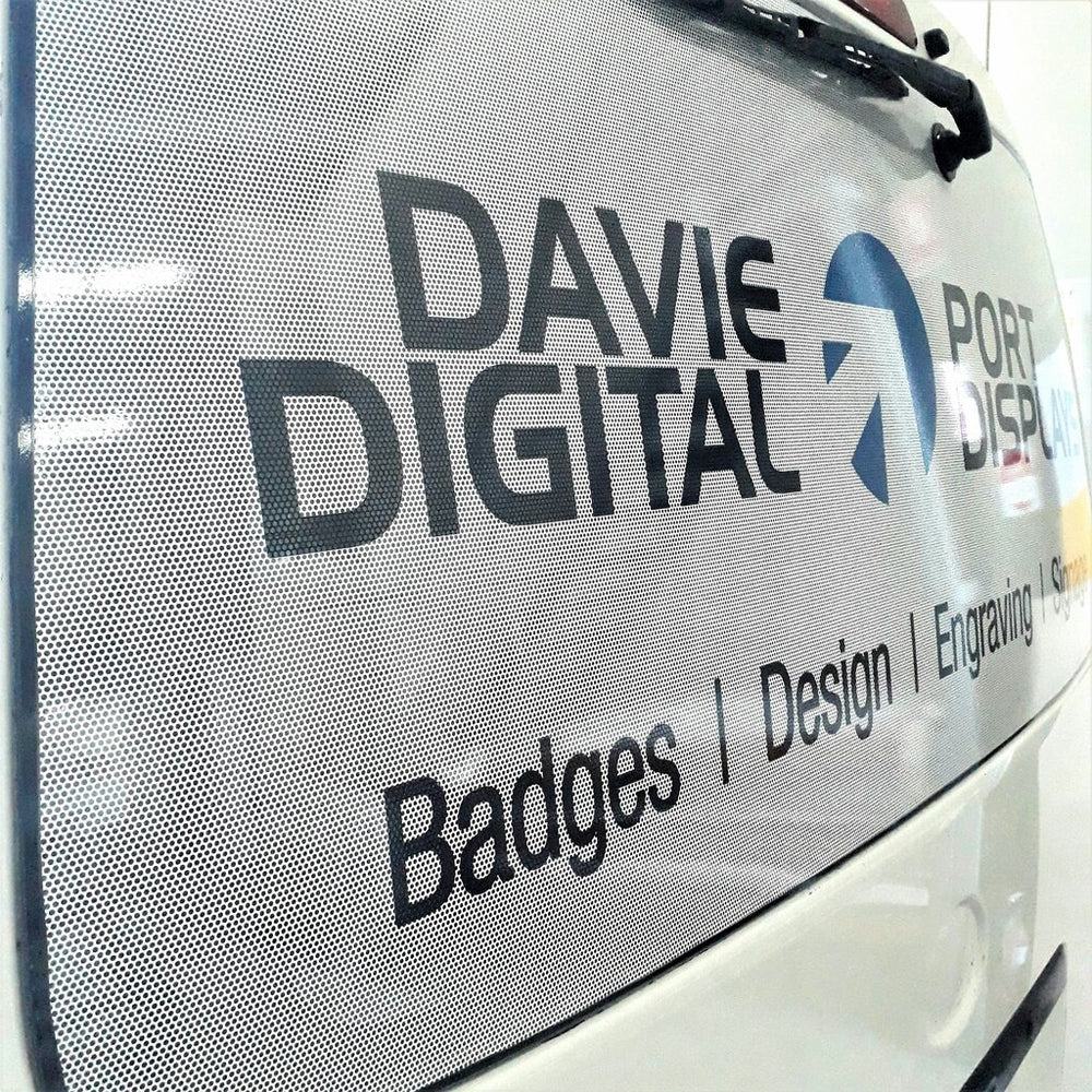 One Way Vision mesh on a rear window, advertise and reduce visibility in to your vehicle