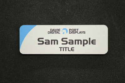 Small plastic name tag with sparkle silver finish, colour print and text