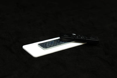 Small name tag with magnetic attachment backing