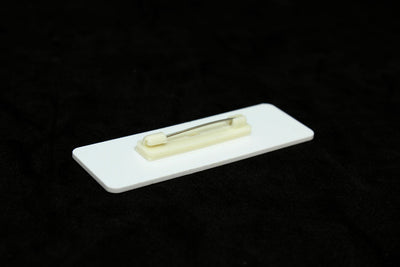 Small pin badge with simple pin attachment