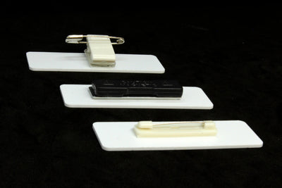 Select the attachemnt type you prefer for your name badge, either a simple pin back, a magnet or a combination pin and clip