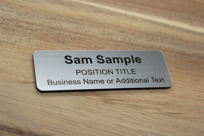 75x25mm standard size name tag with brushed silver finish on UV printed plastic