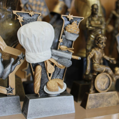 TRophies for all occasiouns, sports, contest and awards in metal, acrylic and glass
